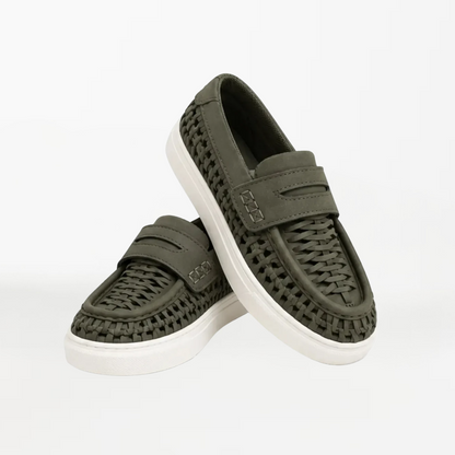 A pair of olive green woven slip-on loafers with white soles, displayed on a clean white background.