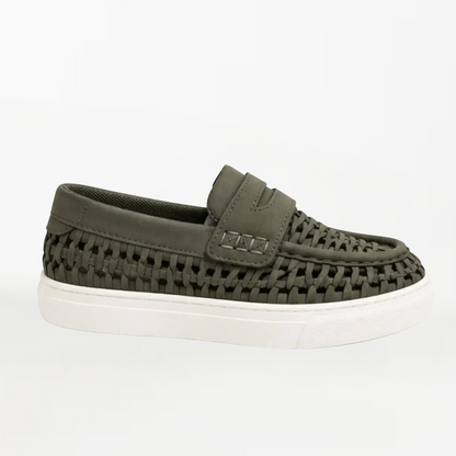 An olive green woven slip-on loafer with a white platform sole, shown in a side profile against a plain white background.