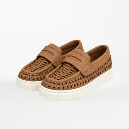 A pair of brown woven slip-on loafers with a thick white sole, photographed on a clean white background.